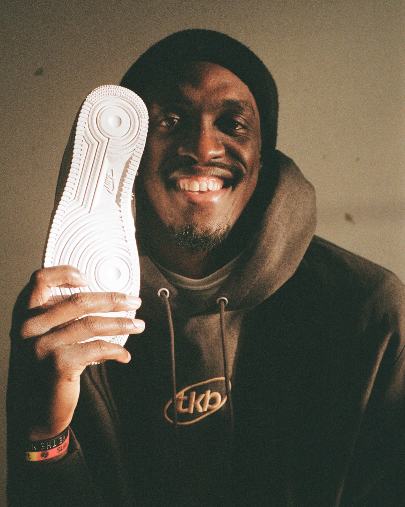 Pascal Siakam holding a sneaker
