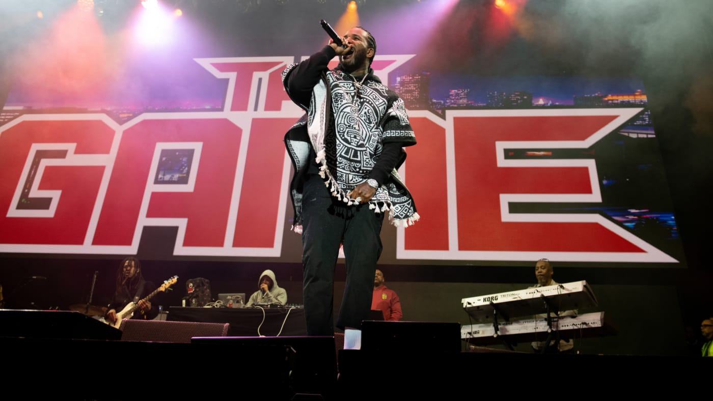 The Game performs at a festival