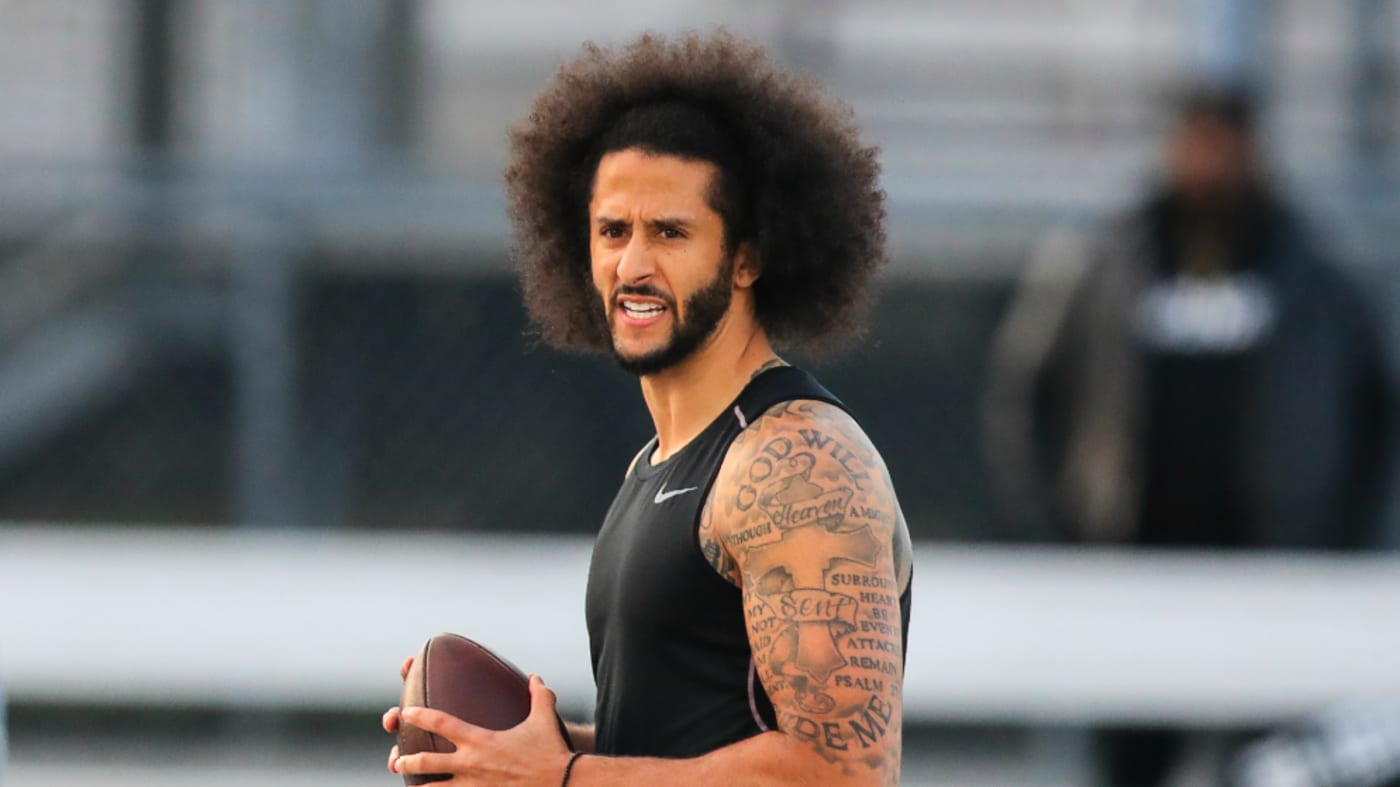 Colin Kaepernick looks to make a pass during a private NFL workout
