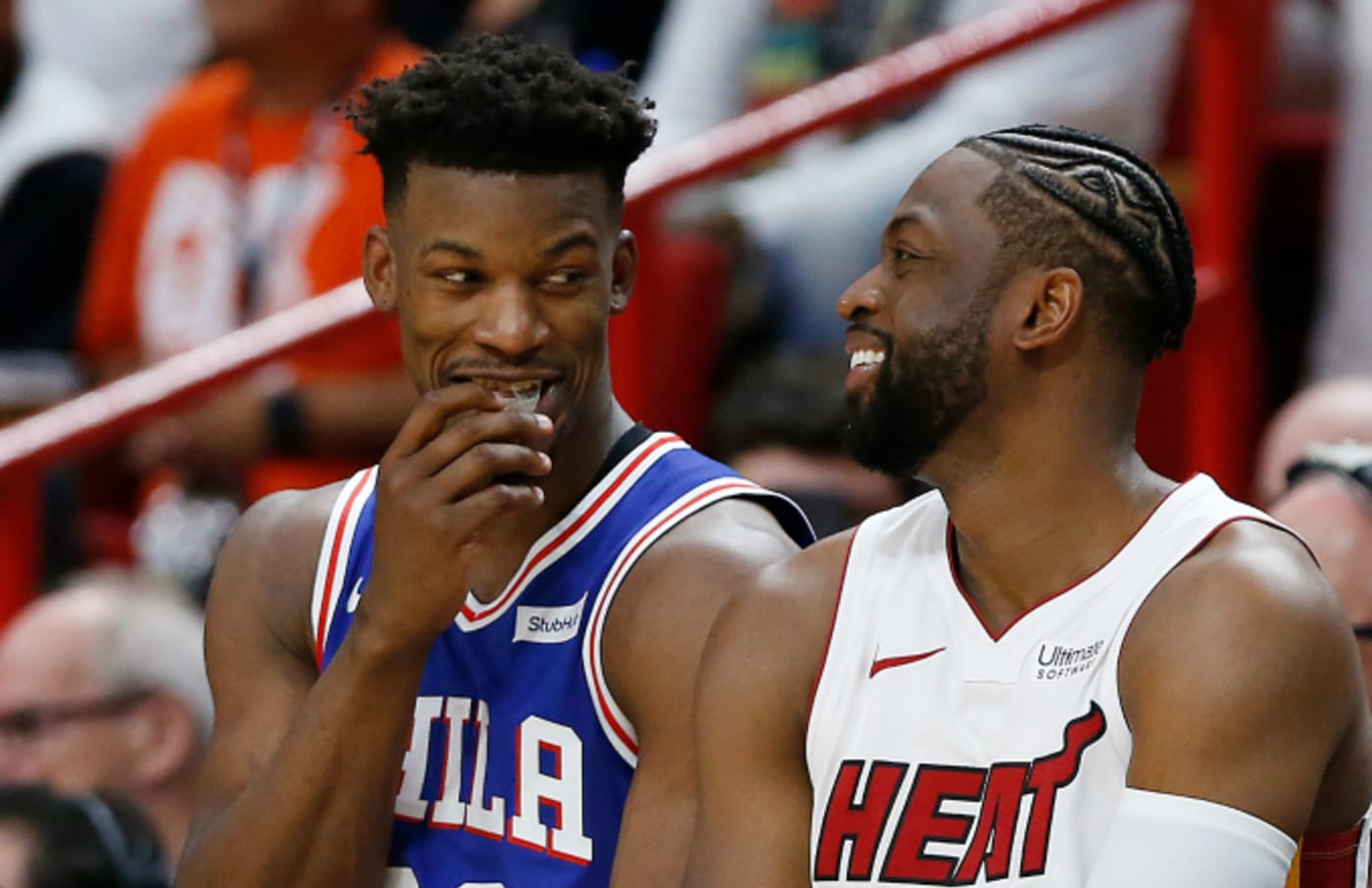 Dwyane Wade #3 of the Miami Heat talks with Jimmy Butler
