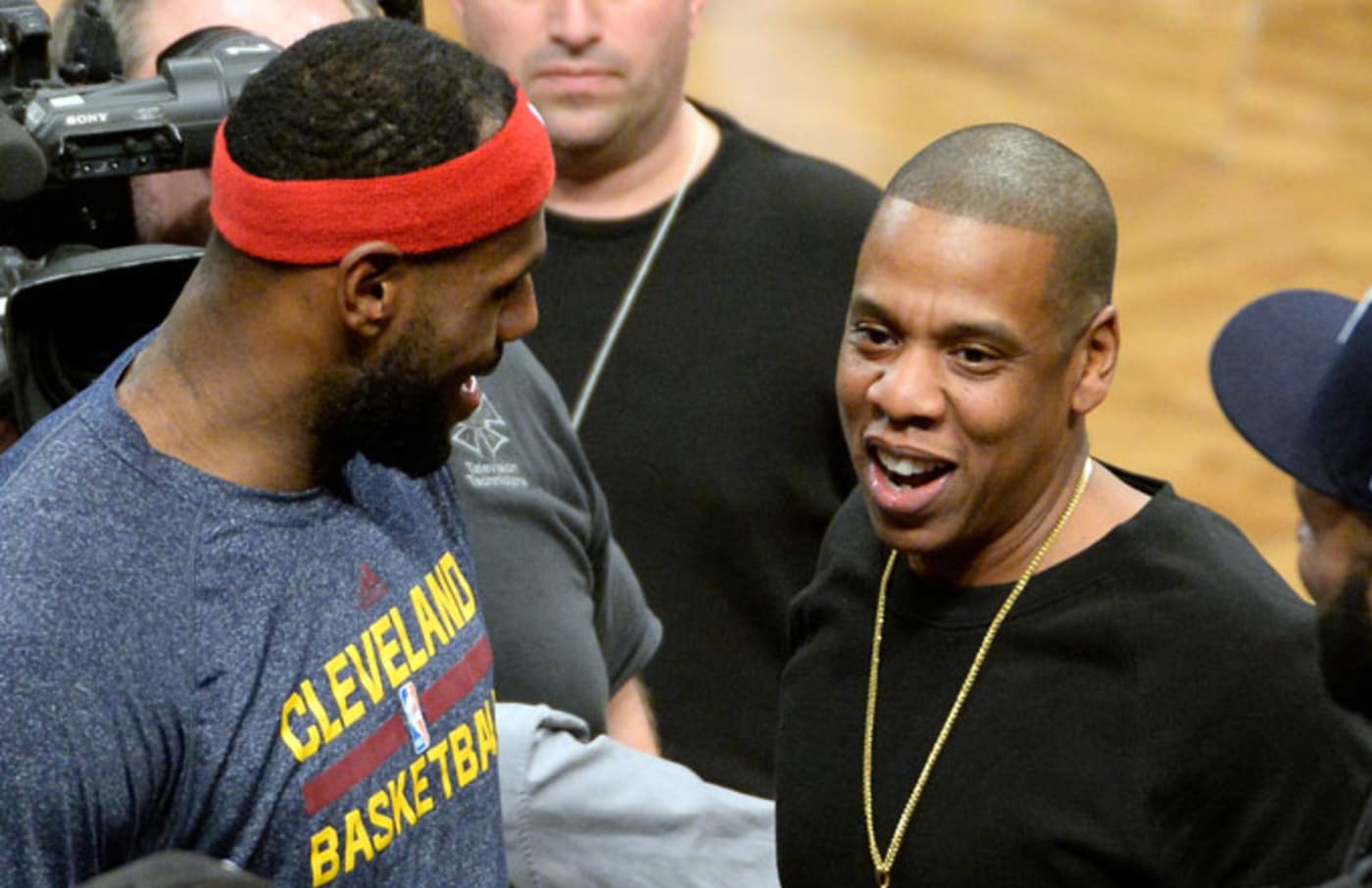 LeBron James talking to Jay Z.