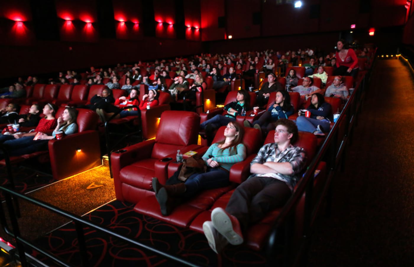 People relax in all powered recliner seats at AMC Movie Theater.