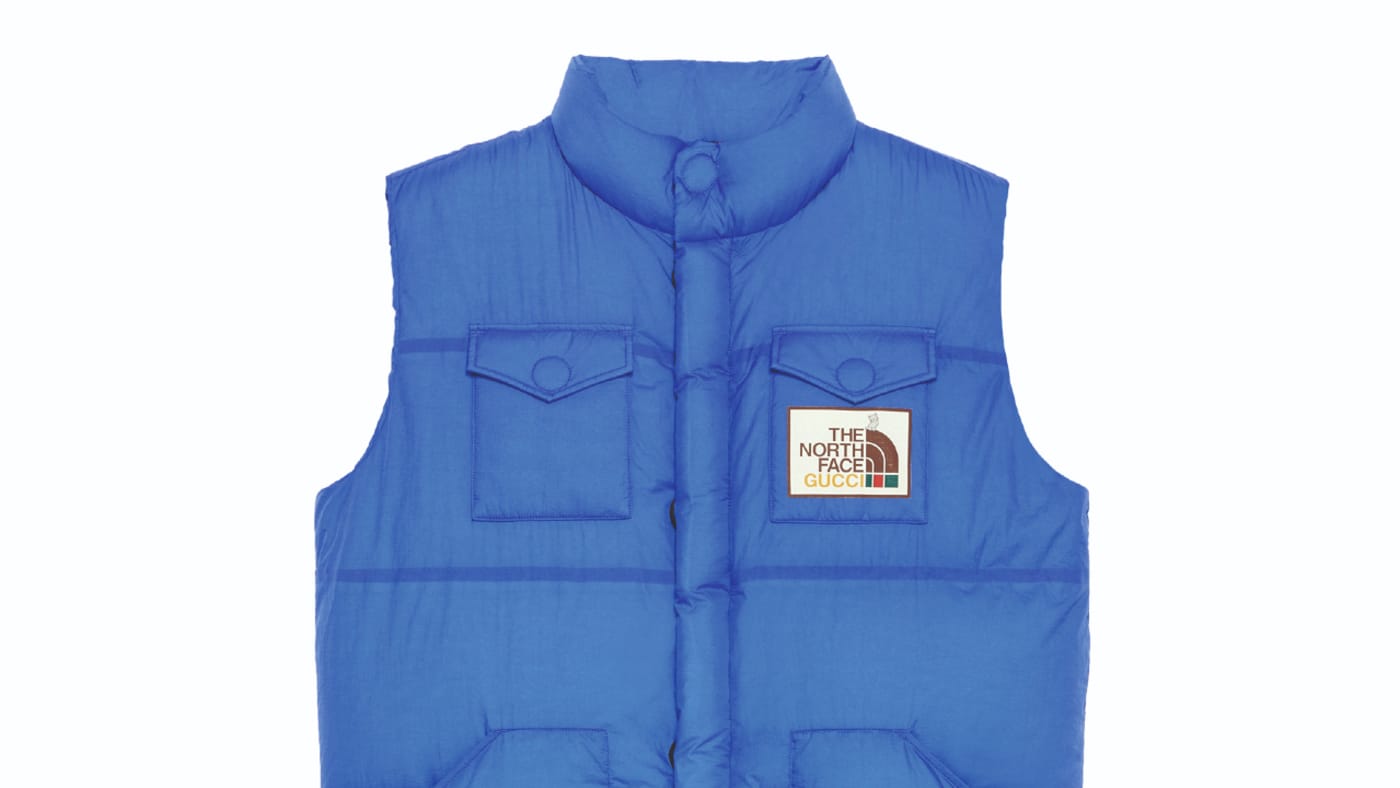 A blue Gucci and North Face vest is pictured