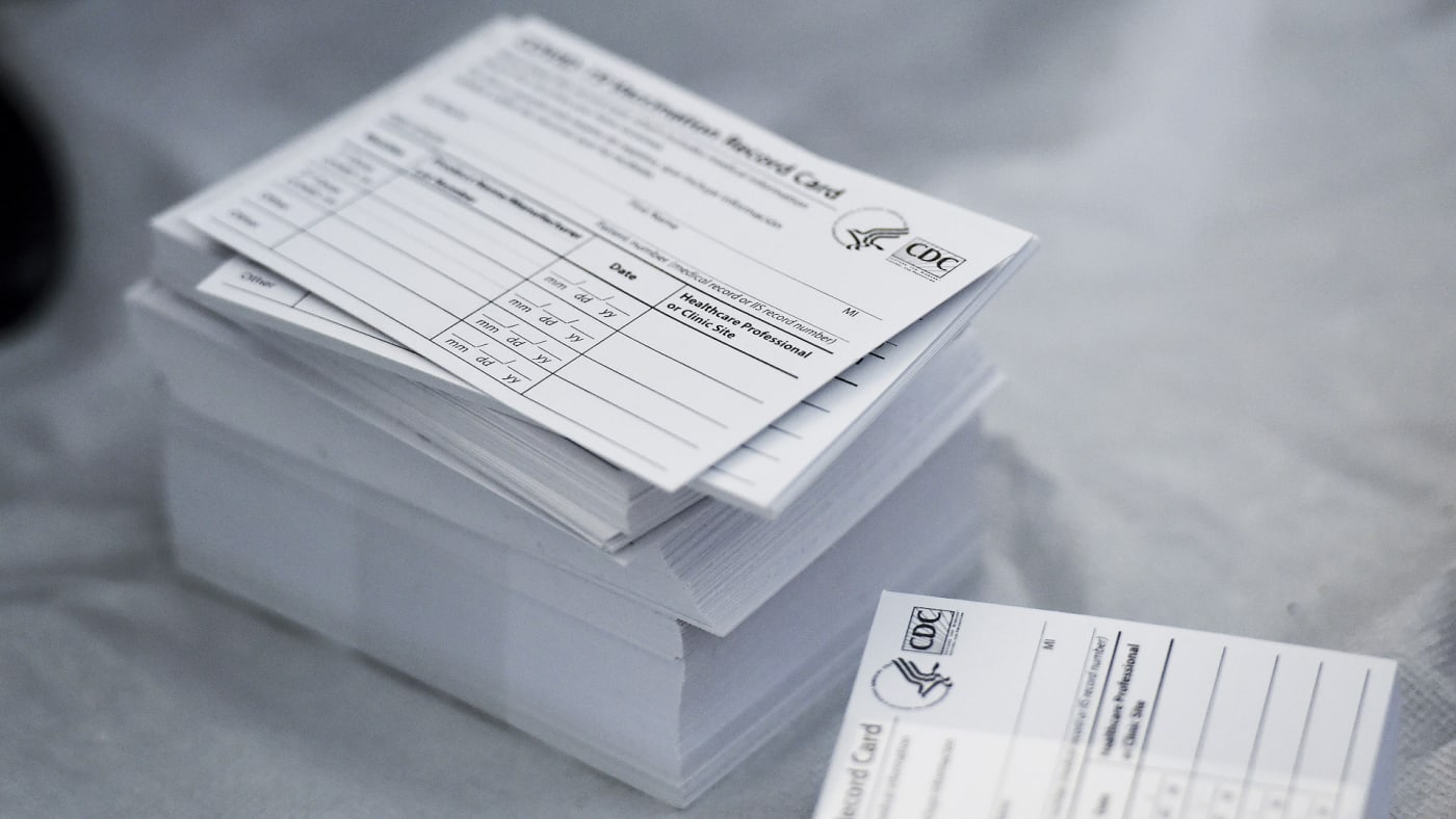 Photograph of stack of blank vaccine cards