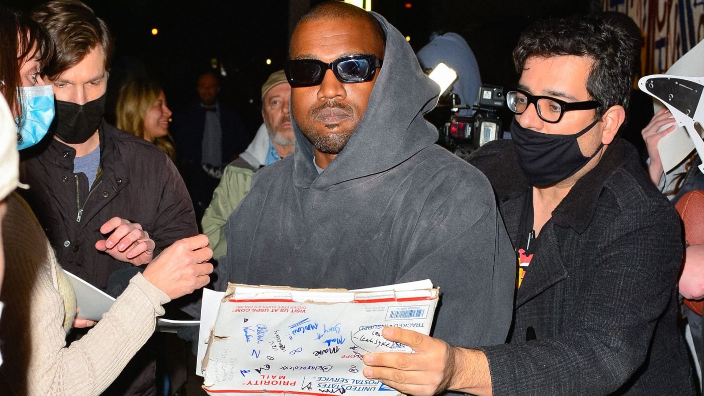 Ye is surrounded by paparazzi in Los Angeles