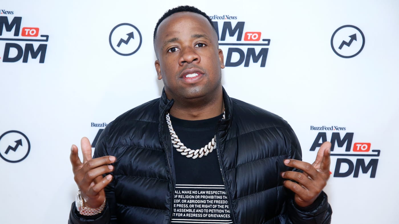 Yo Gotti poses for photos at an appearance.