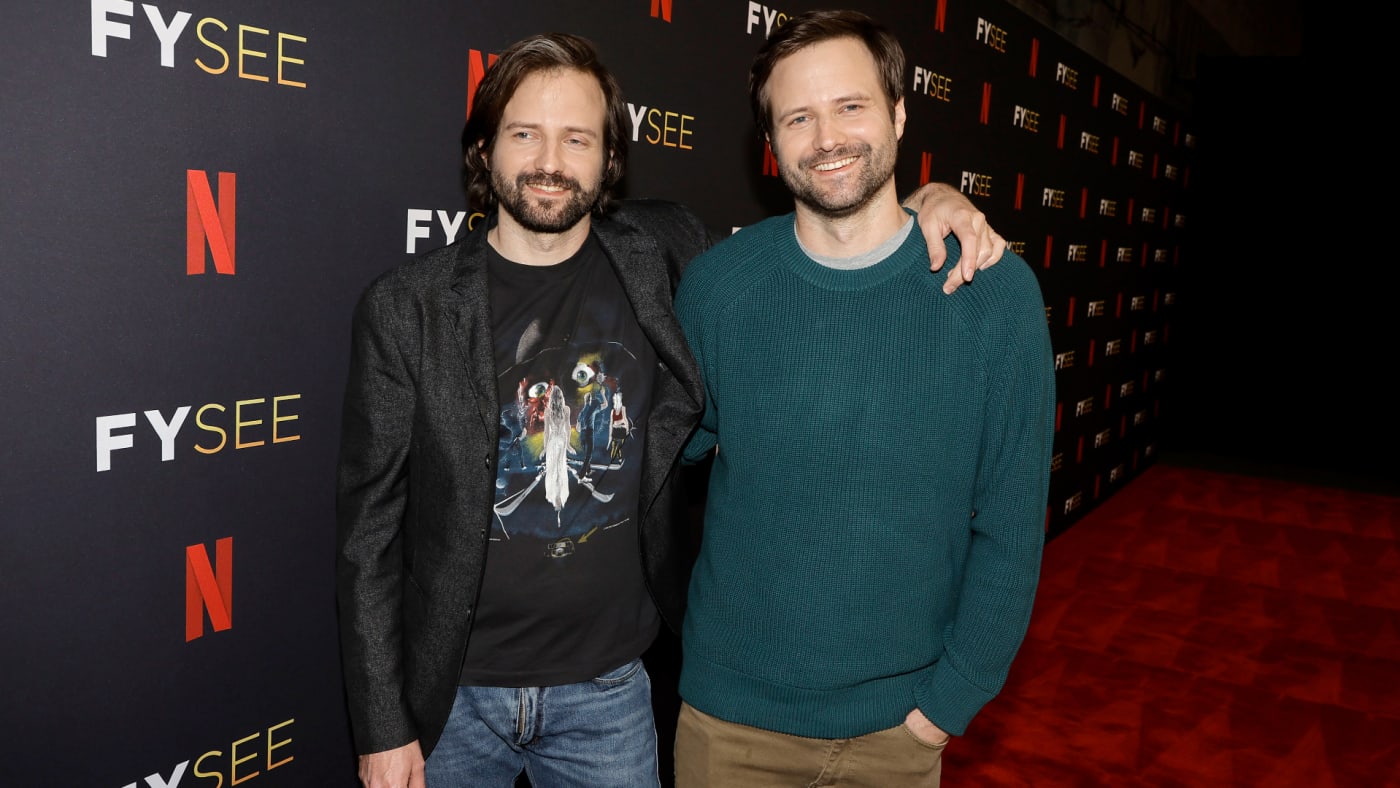 The Duffer Brothers are pictured on a Netflix red carpet