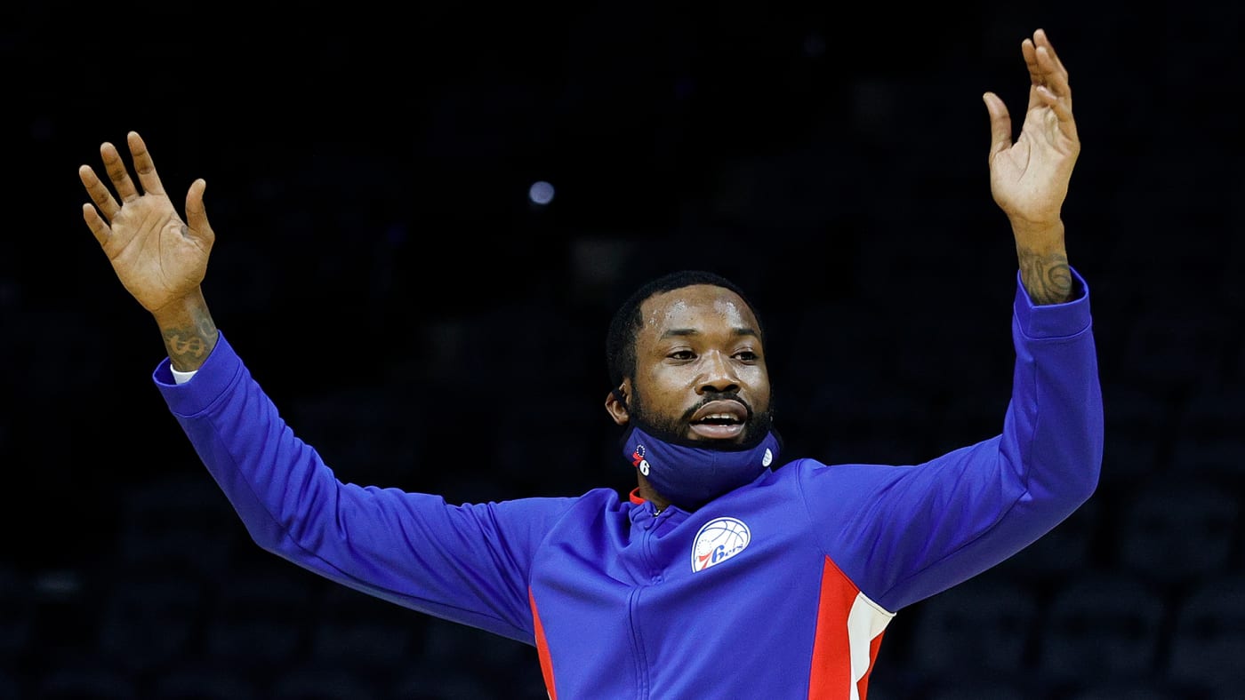 Meek Mill looks on during a charity event before a game between the Philadelphia 76ers and the Miami Heat