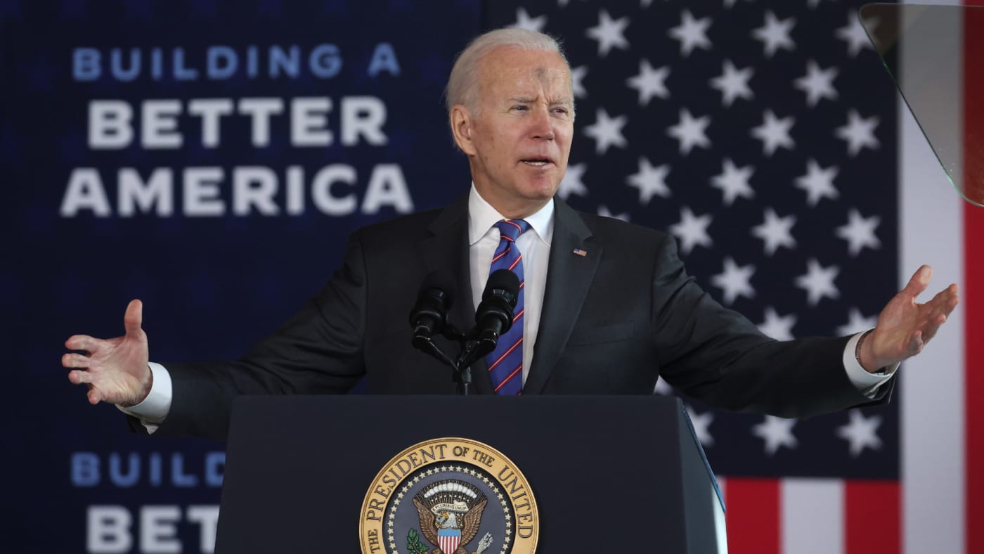 President Joe Biden is shown at the podium