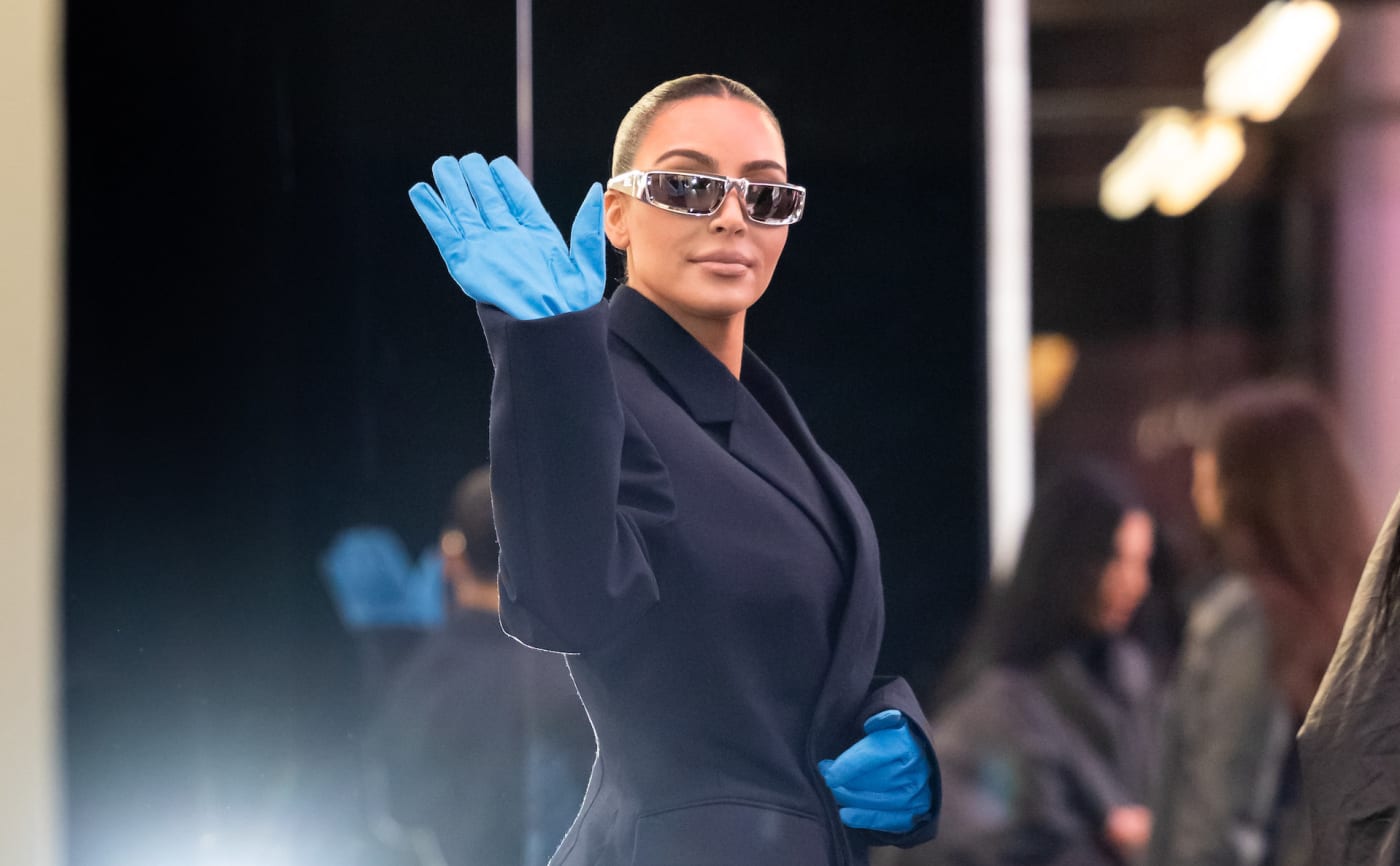 Kim Kardashian waving goodbye