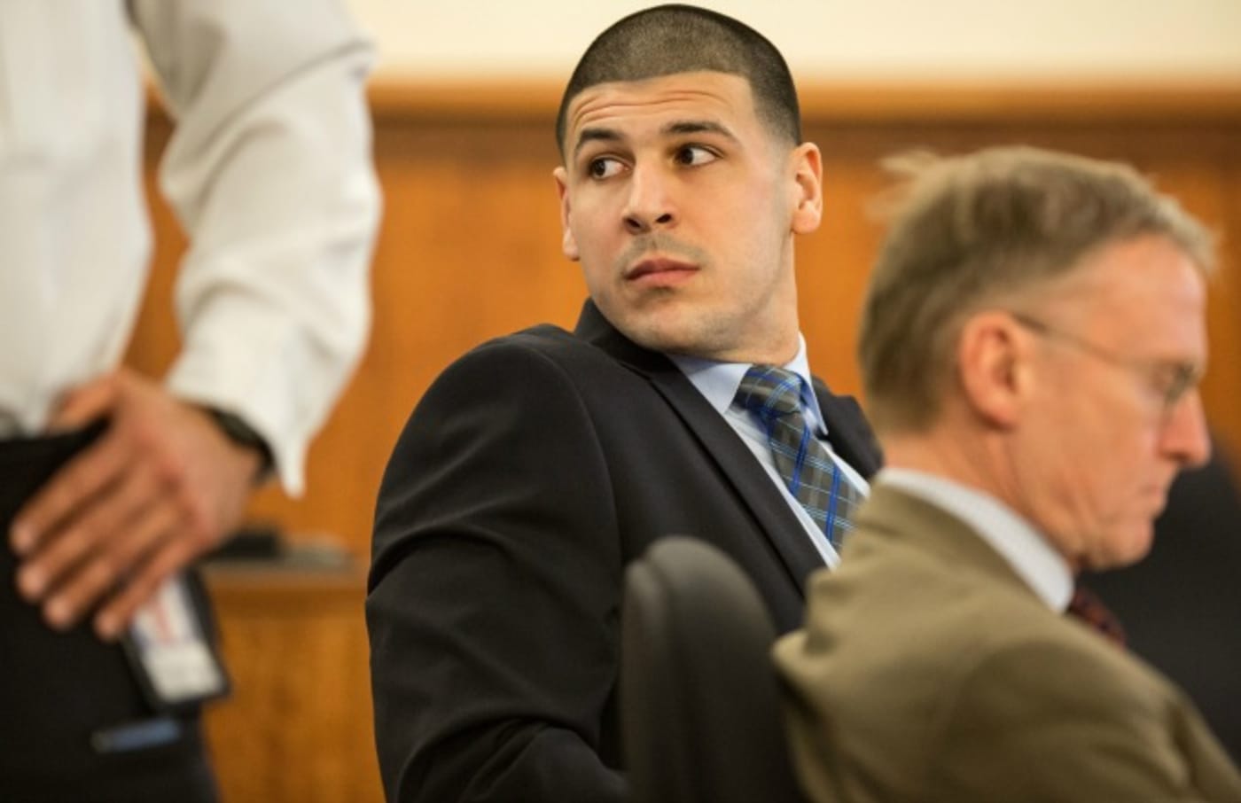 Aaron Hernandez looks on during his murder trial.
