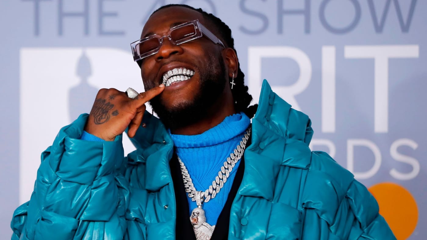 Burna Boy, one of the richest Nigerian musicians, showing off his grills