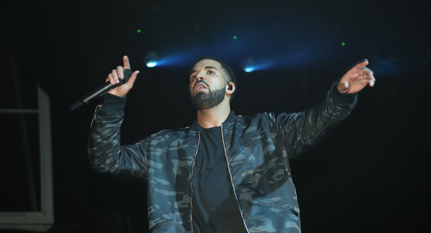 Drake performing on stage in 2019