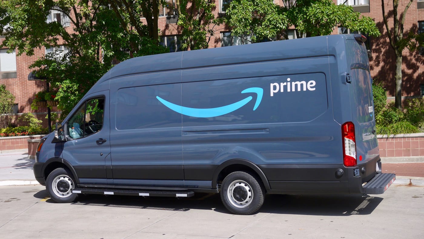 View of an Amazon delivery van parked at an apartment complex in Chicago.
