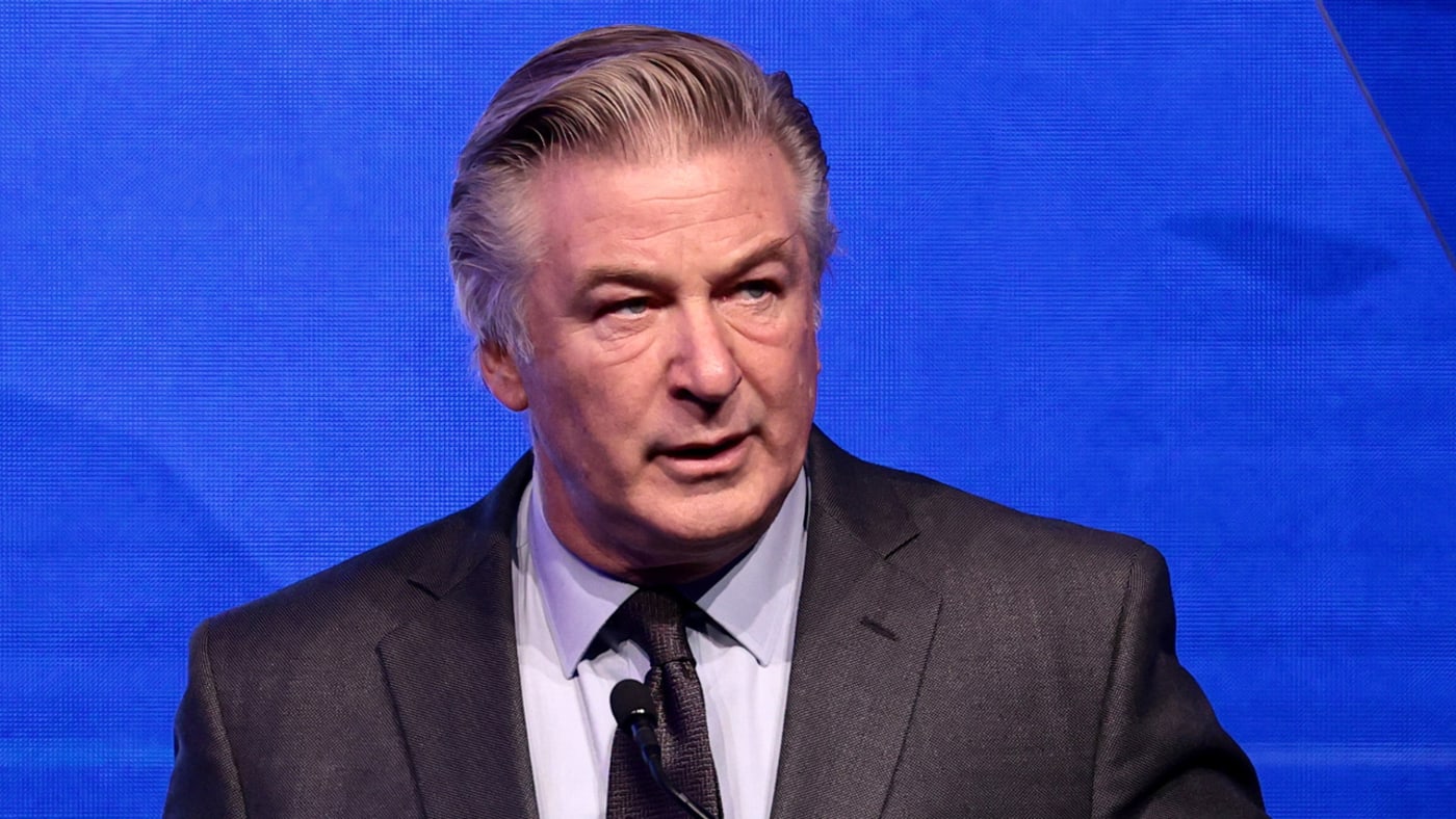 Alec Baldwin is pictured at a podium