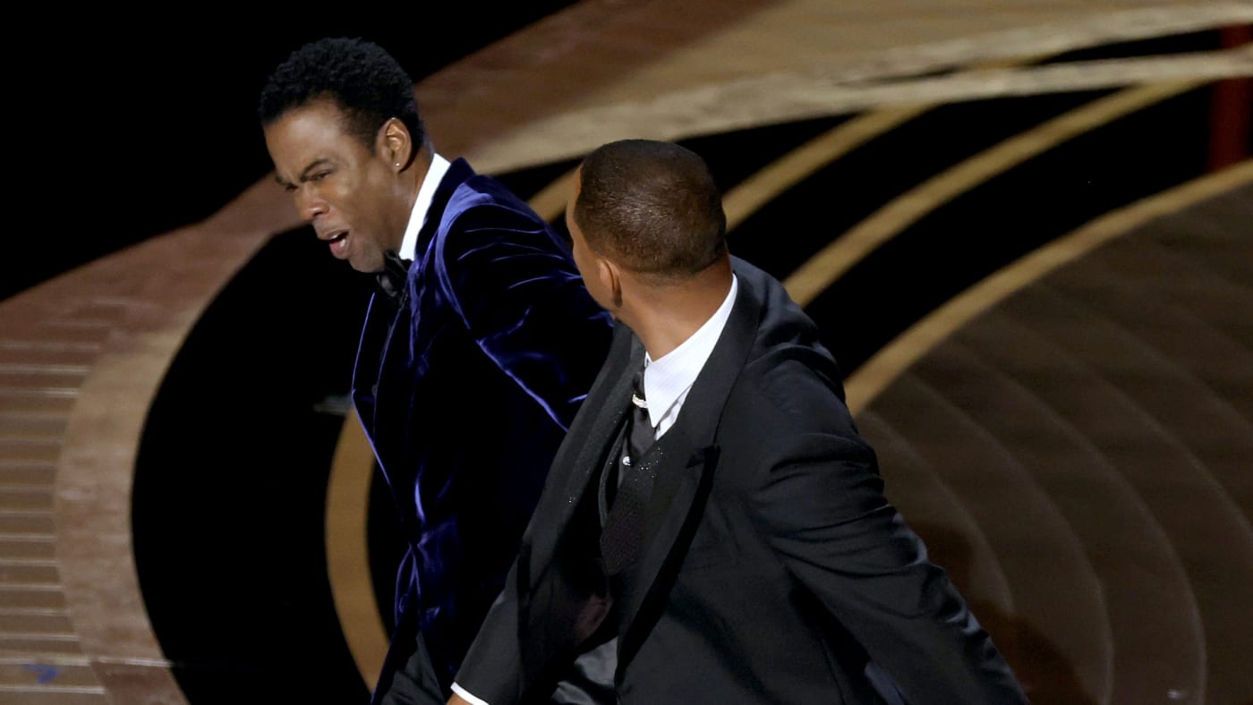 Chris Rock and Will Smith are seen onstage during the 94th Annual Academy Awards
