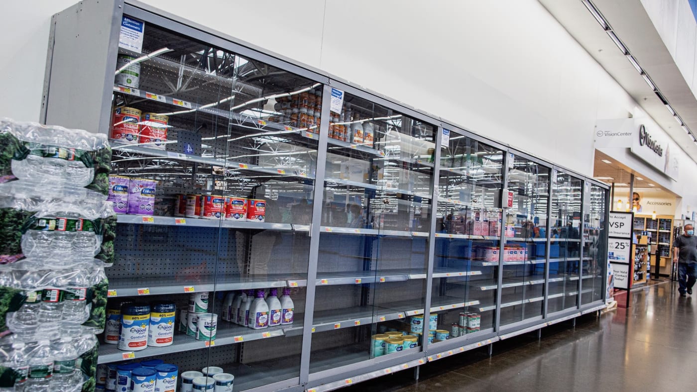 Shelves are empty at a Walmart store during a baby formula shortage