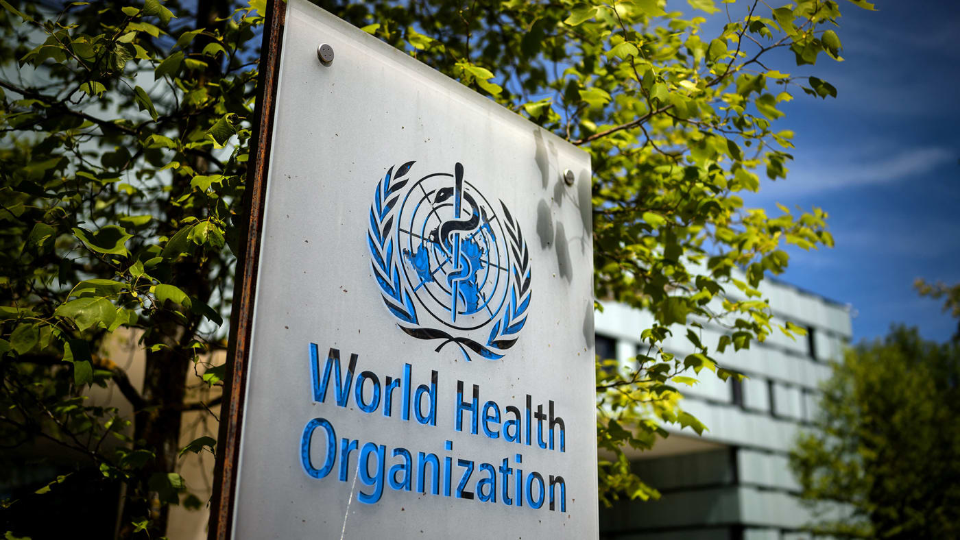 A picture taken on May 8, 2021 shows a sign of the World Health Organization (WHO) at the entrance of their headquarters