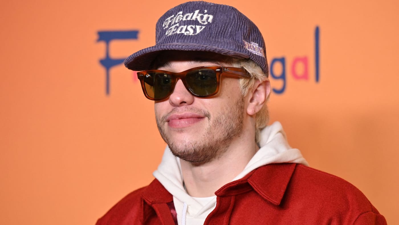 Pete Davidson is pictured wearing a hat