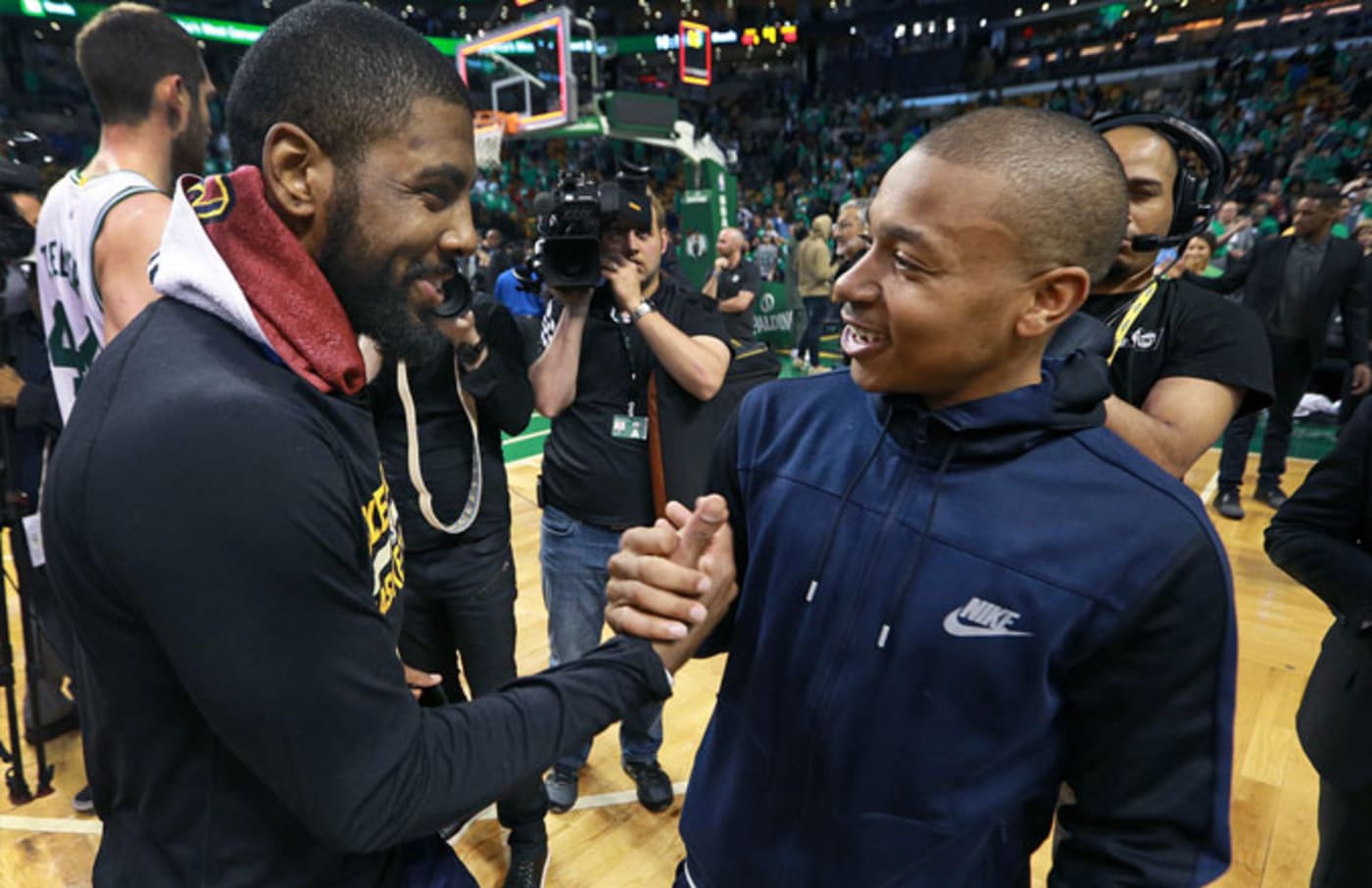 Kyrie Irving and Isaiah Thomas exchange a handshake.