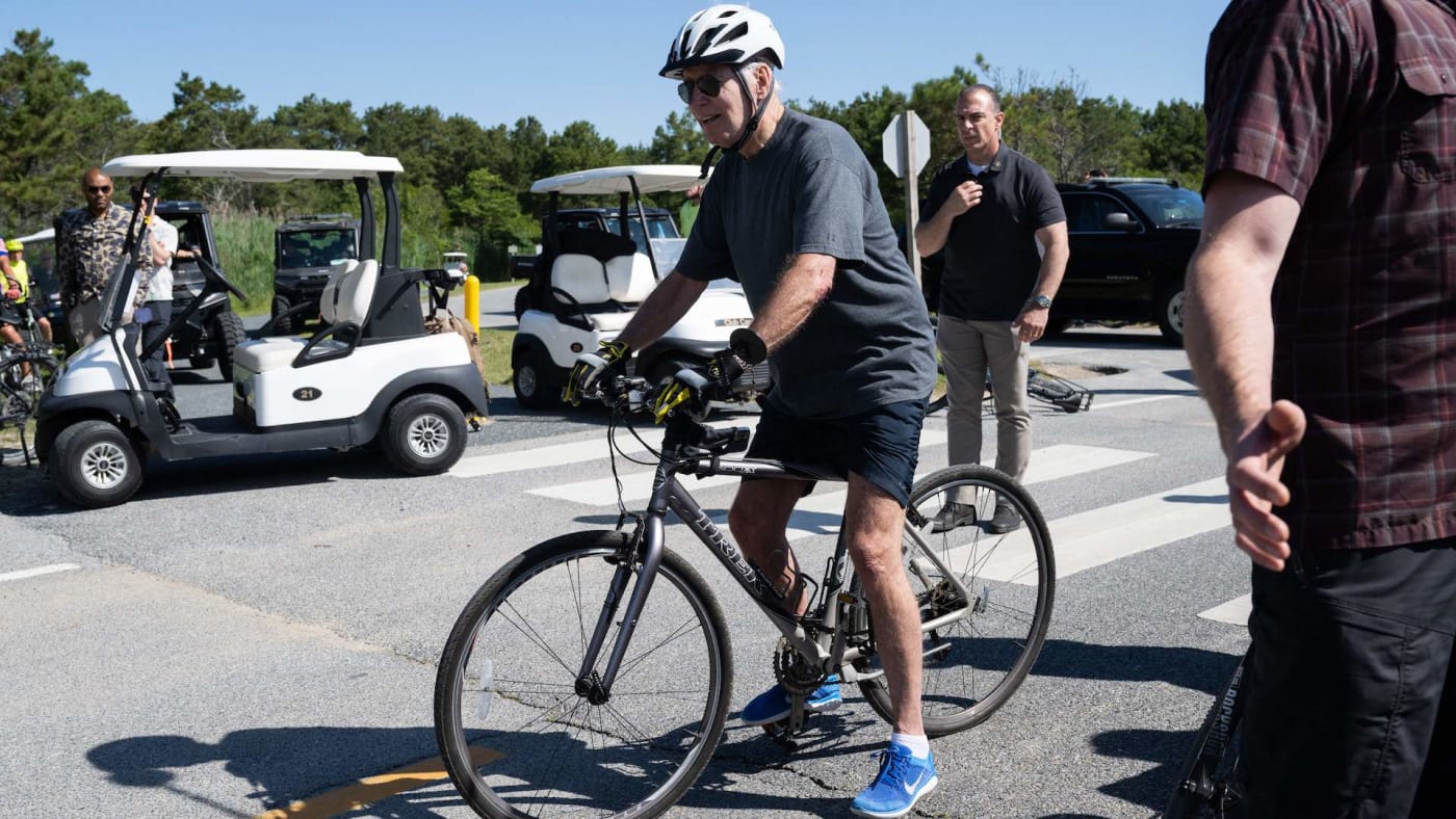 Photograph of Joe Biden on bike before fall