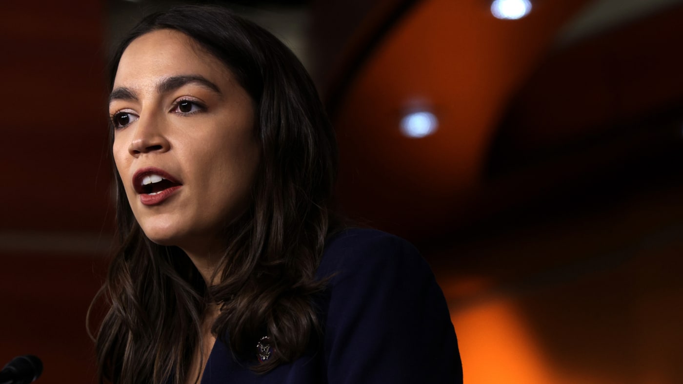 AOC is seen speaking during an event