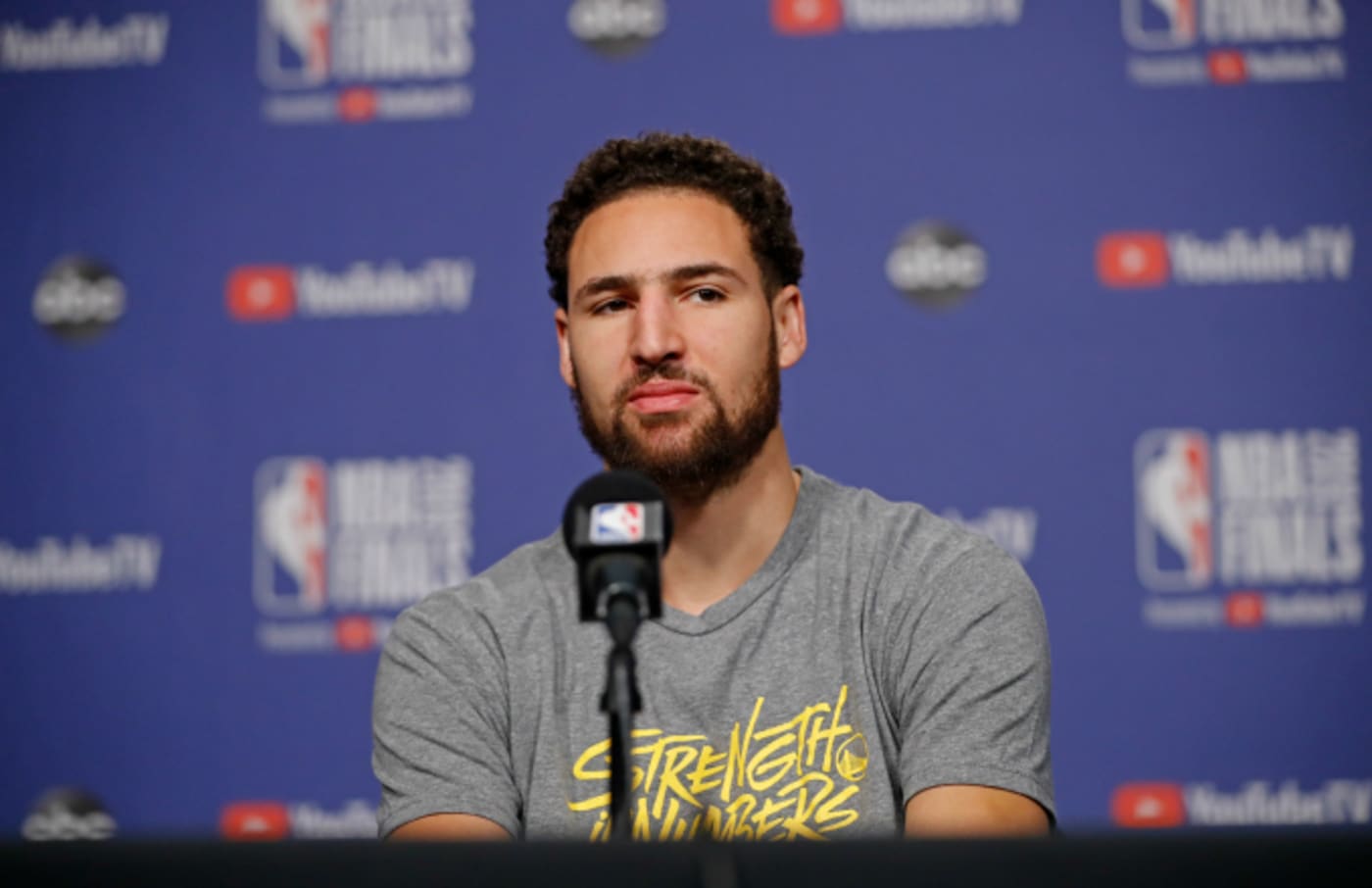 Klay Thompson #11 of the Golden State Warriors answers questions