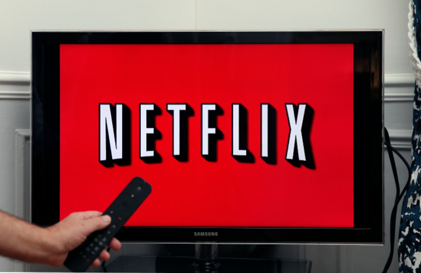 In this photo illustration, the Netflix media service provider's logo