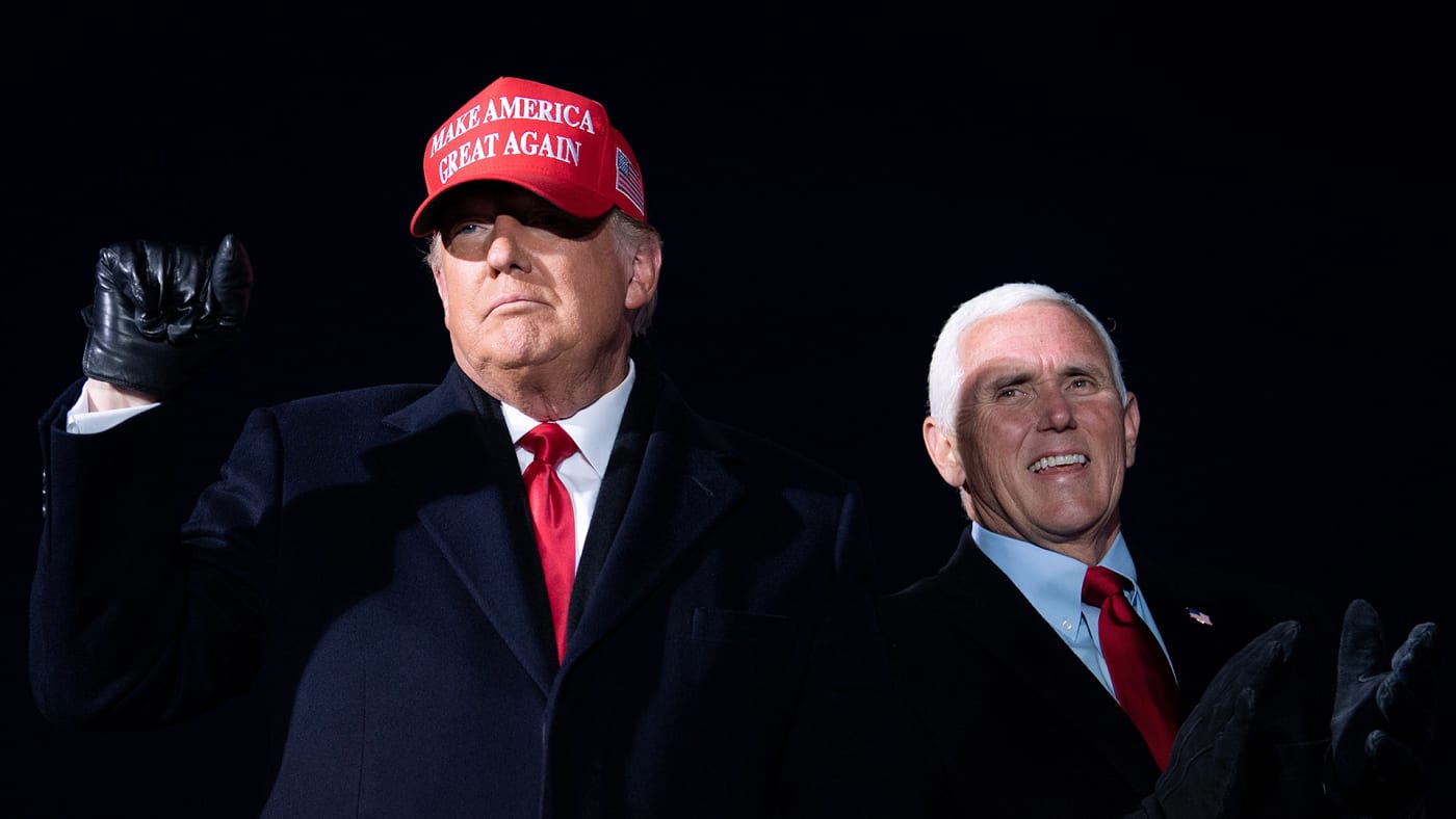 Donald Trump arrives with US Vice President Mike Pence for a Make America Great Again rally