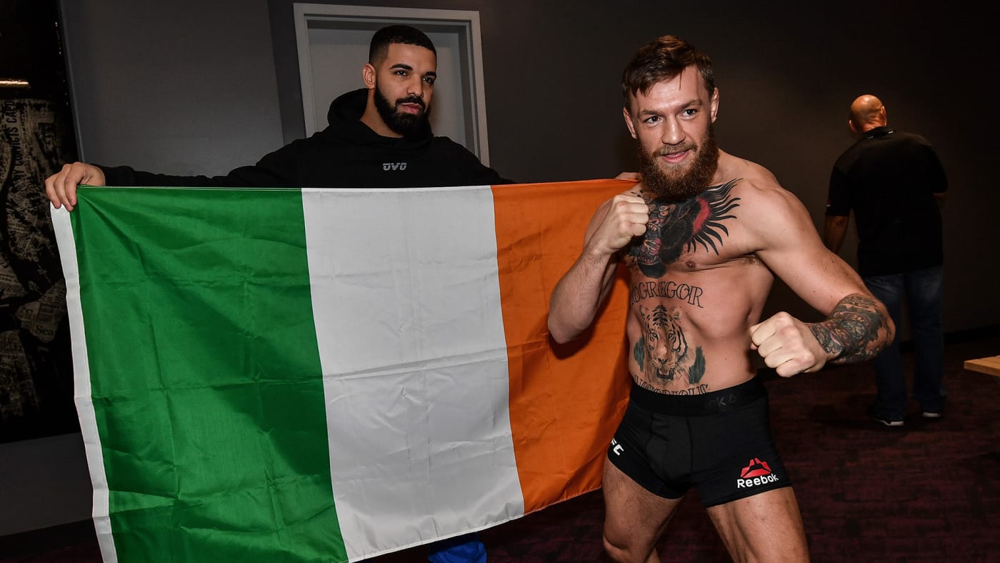 Rapper Drake and Conor McGregor pose for a photo backstage during the UFC 229 weigh in