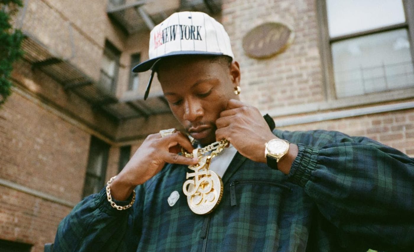 Joey Badass in chain and hat