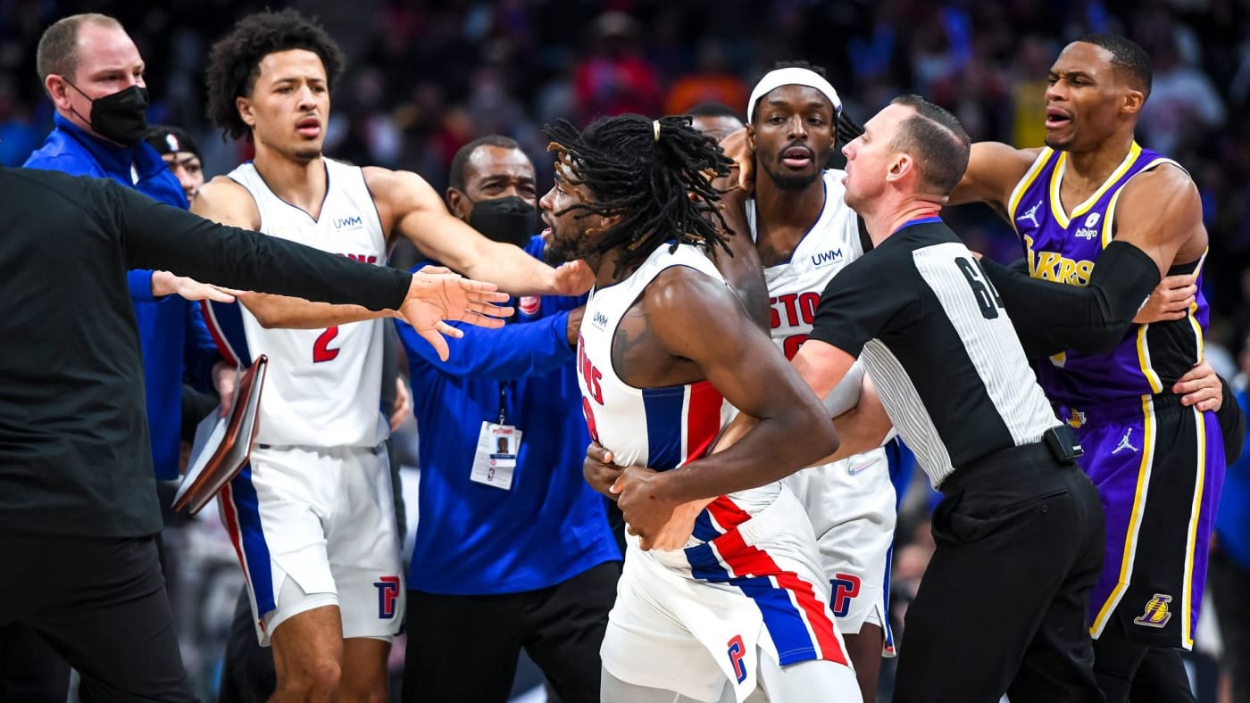 Isaiah Stewart of the Pistons is restrained as he goes after LeBron James