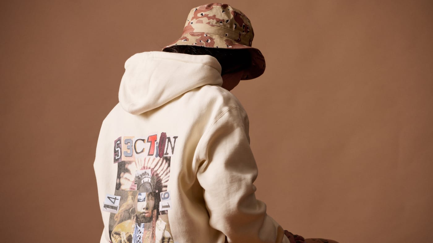 A faceless model wearing a Section 35 hoodie