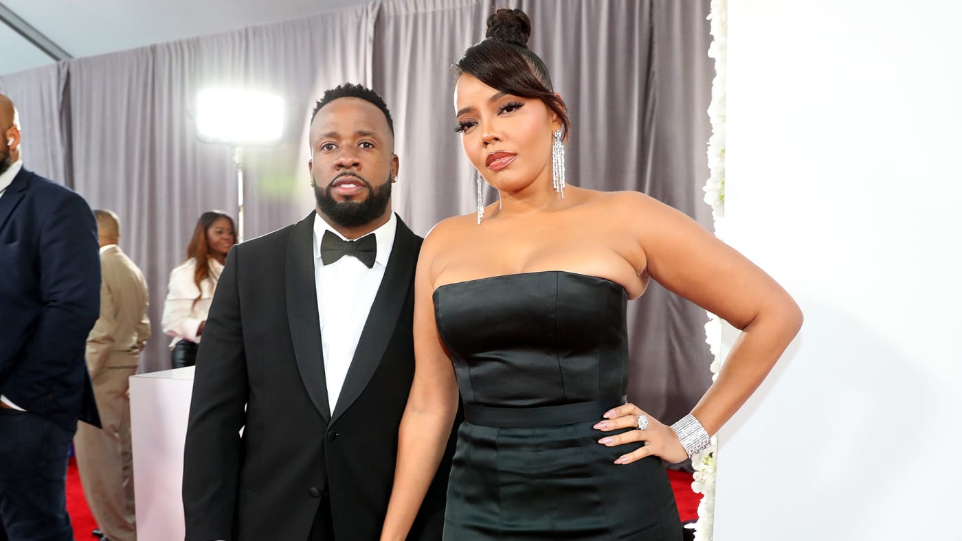 Yo Gotti and Angela Simmons attend the 65th GRAMMY Awards at Crypto.com Arena