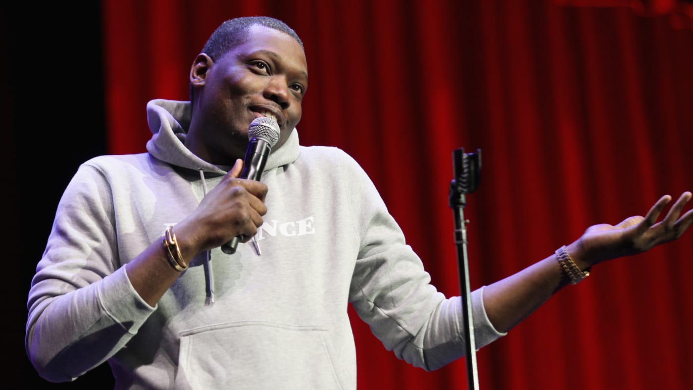 Michael Che performs on the Bill Graham Stage