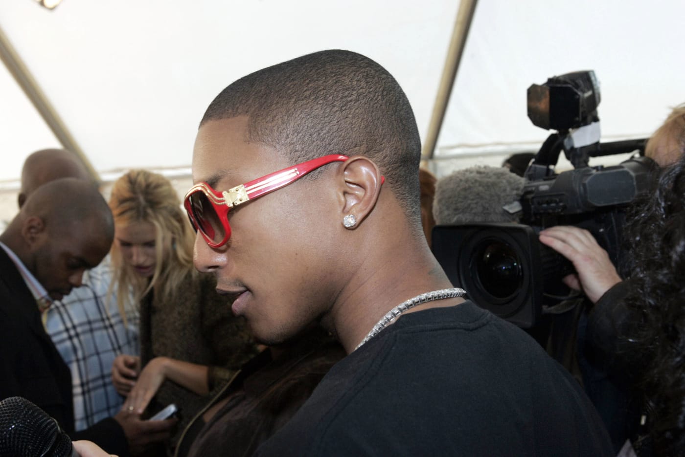 Pharrell wearing LV Millionaire sunglasses