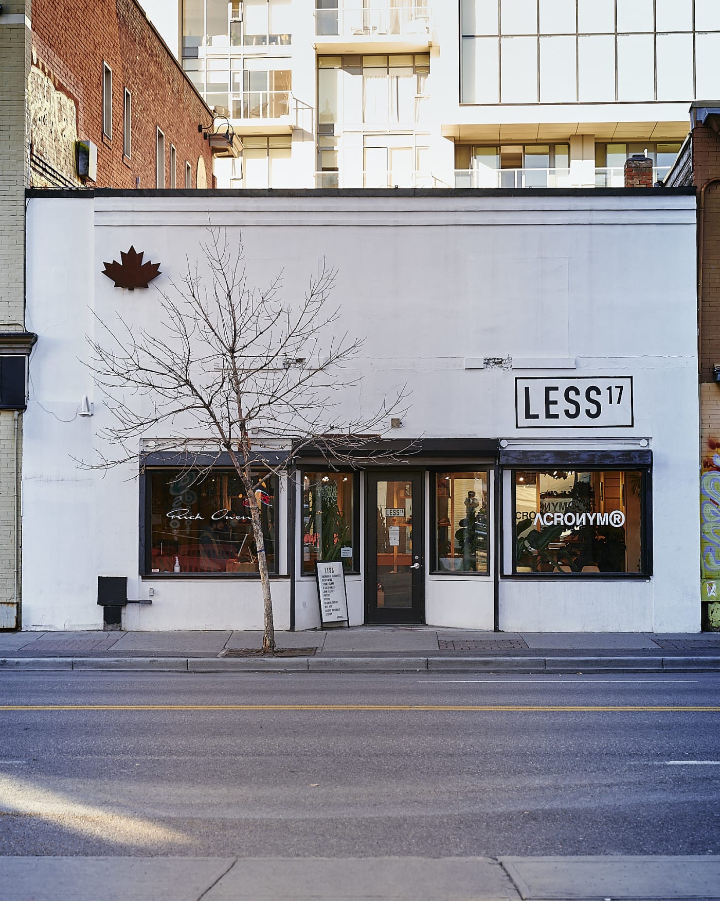 The outside of Less 17 from across a street