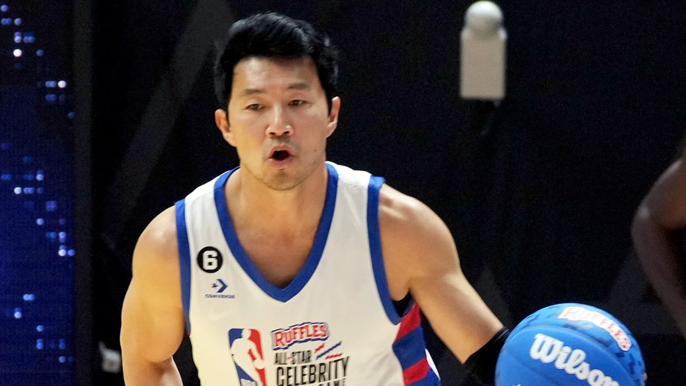Simu Liu plays in the Ruffles Celebrity Game during the 2023 NBA All Star Weekend