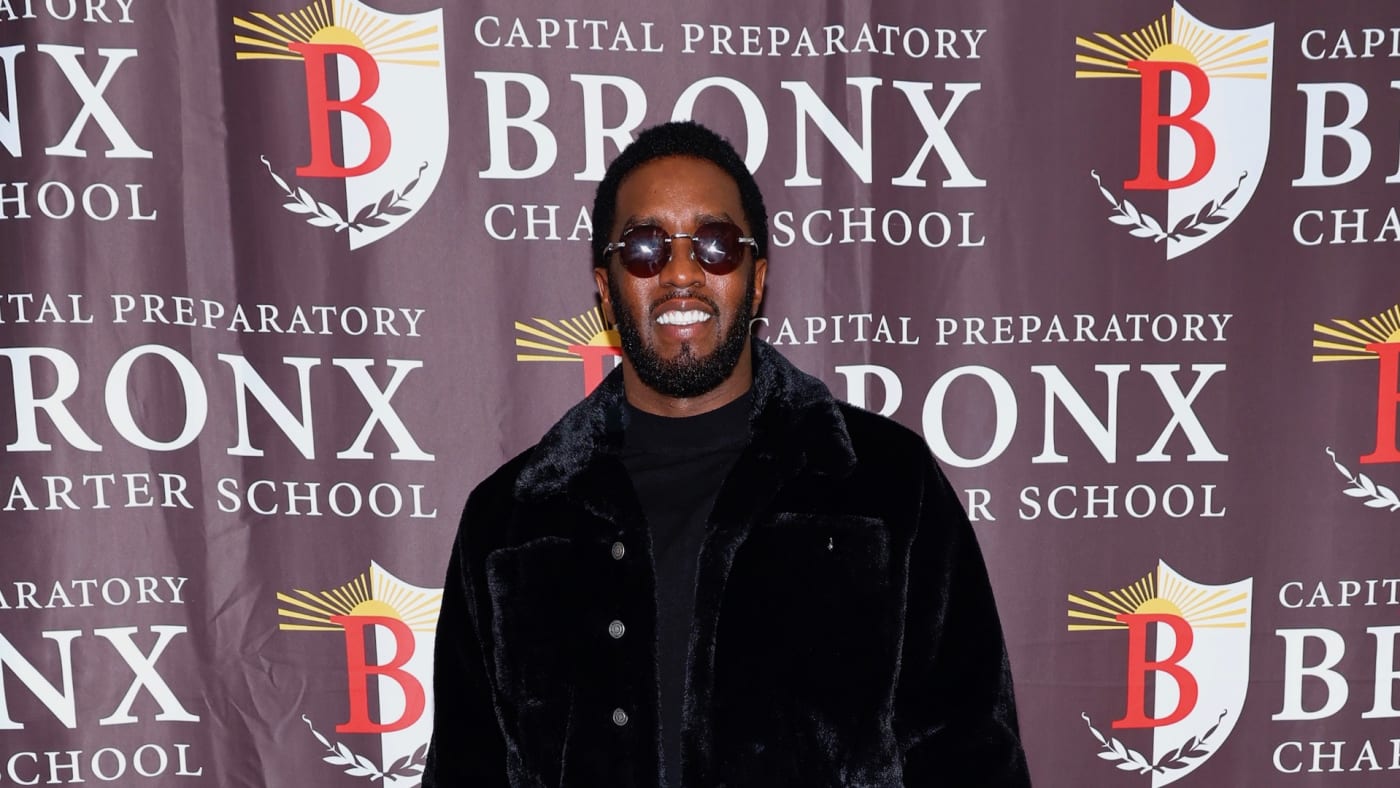 Sean “Diddy” Combs poses for a photo at his Capital Preparatory School