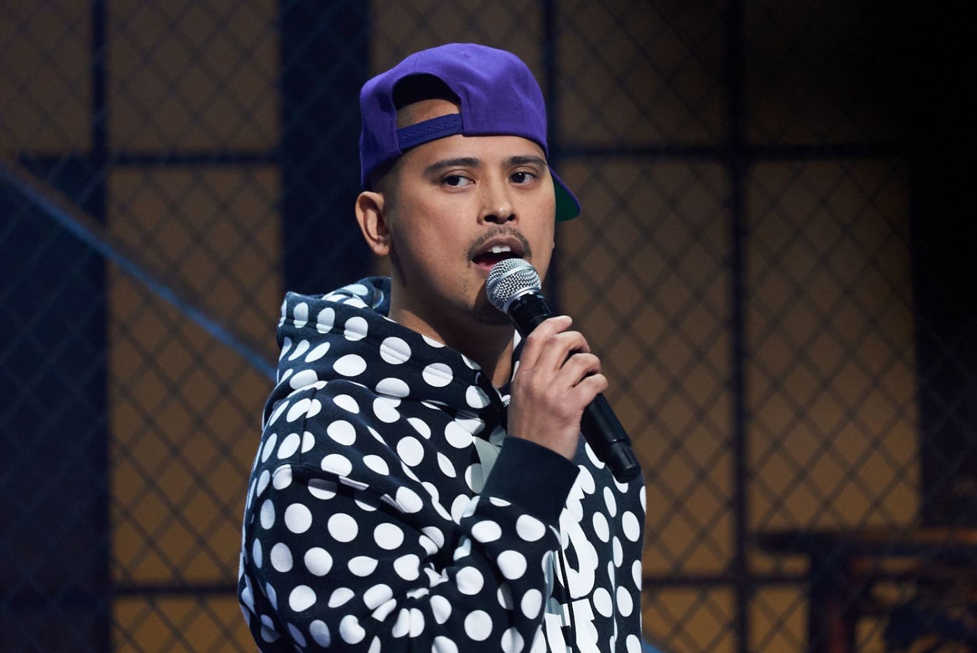 Filipino Canadian comedian Keith Pedro performs on stage