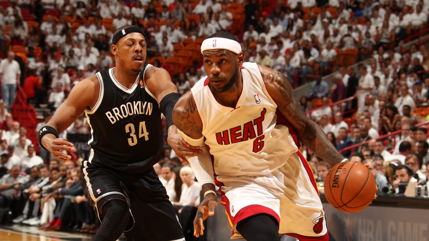 LeBron James #6 of the Miami Heat drives against Paul Pierce #34 of the Brooklyn Nets in 2014