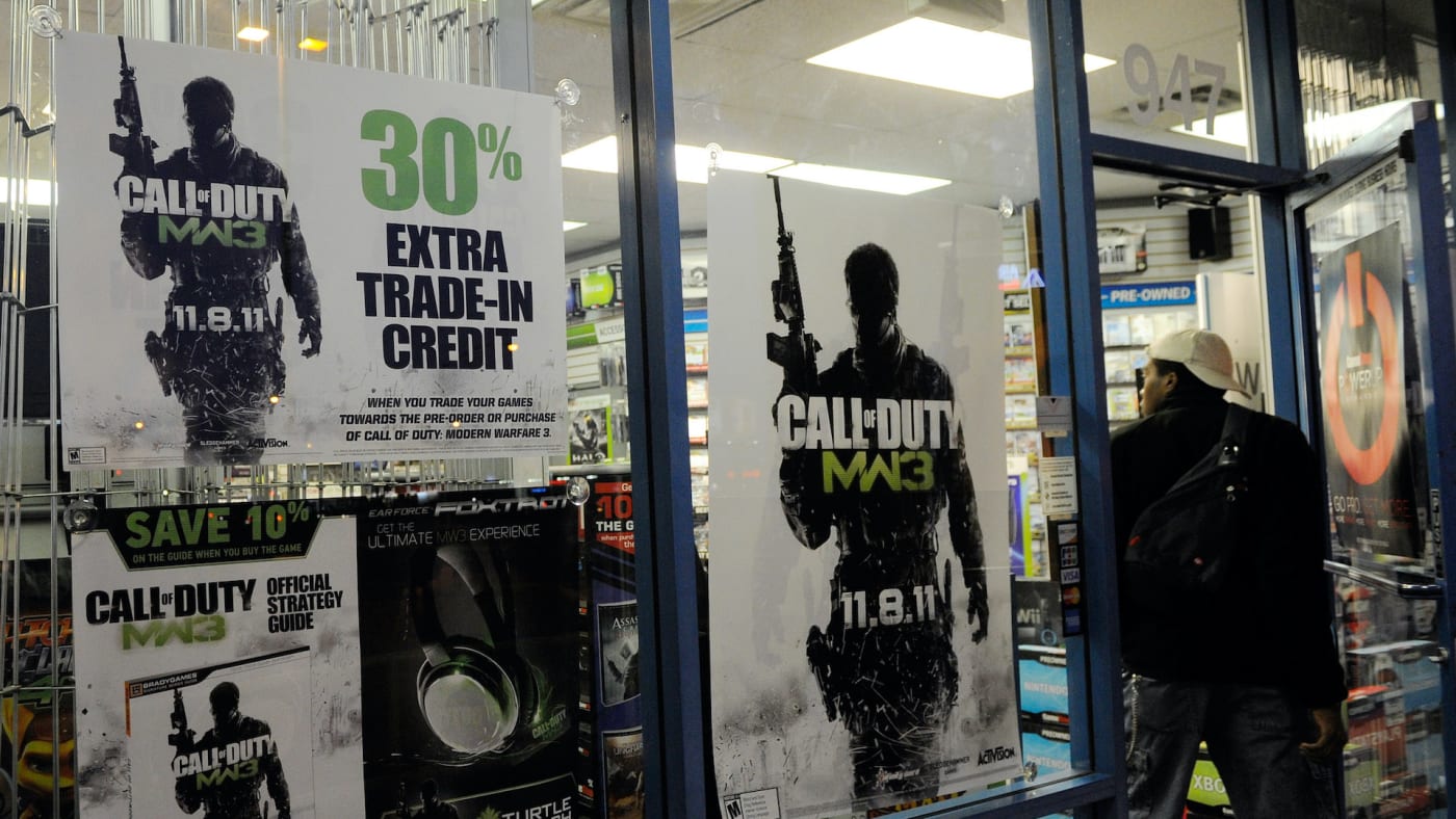 Posters outside a GameStop advertise the highly anticipated video game, "Call Of Duty: Modern Warfare 3."