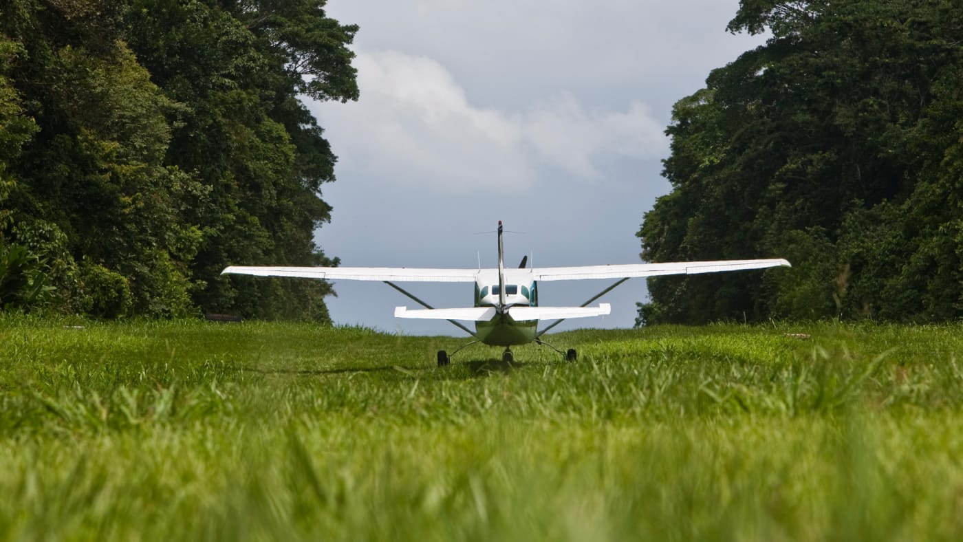 Cessna 206 on the runway of the ranger station in Corcovado National Park.