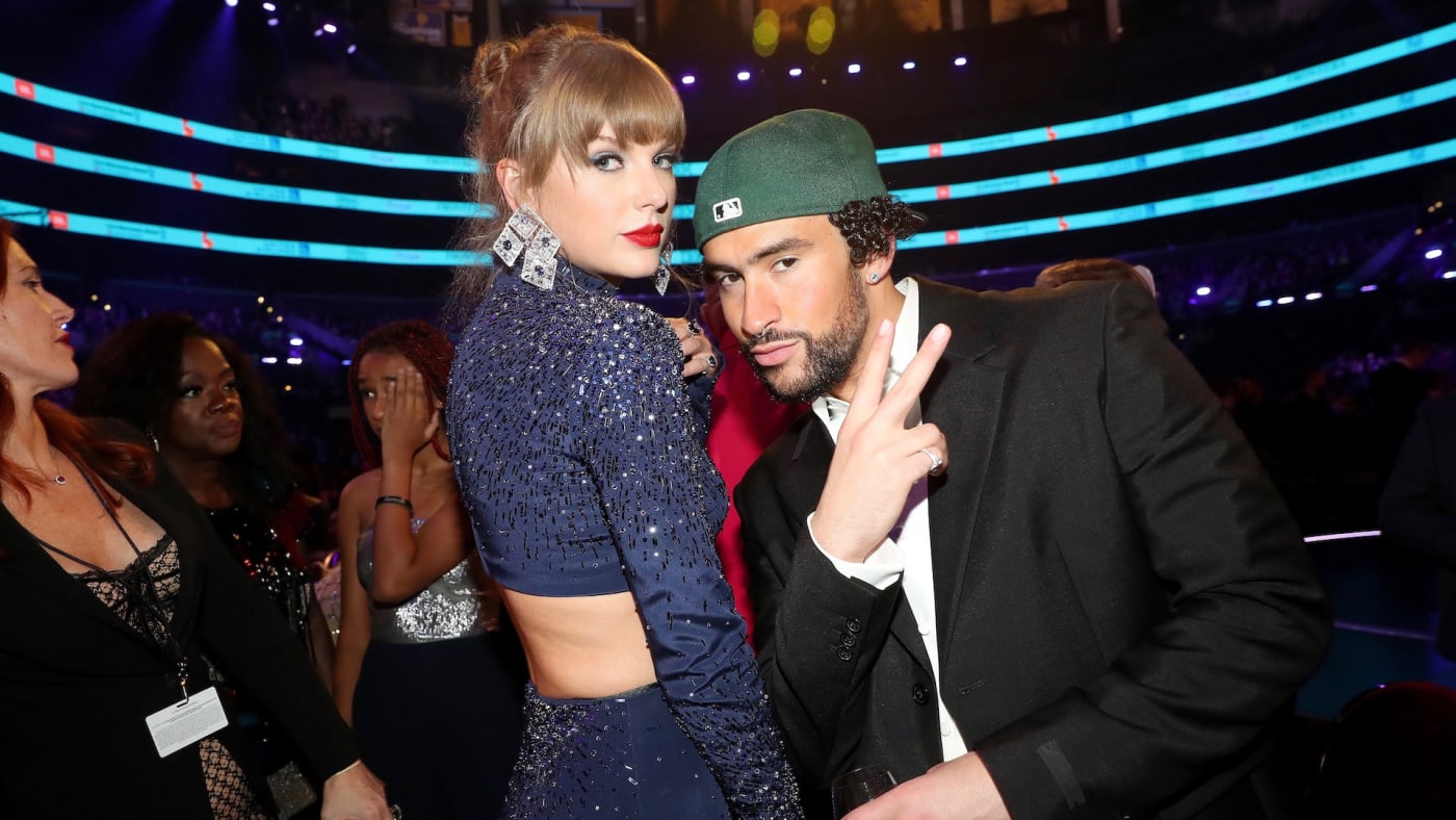 Taylor Swift and Bad Bunny pose during the 65th GRAMMY Awards