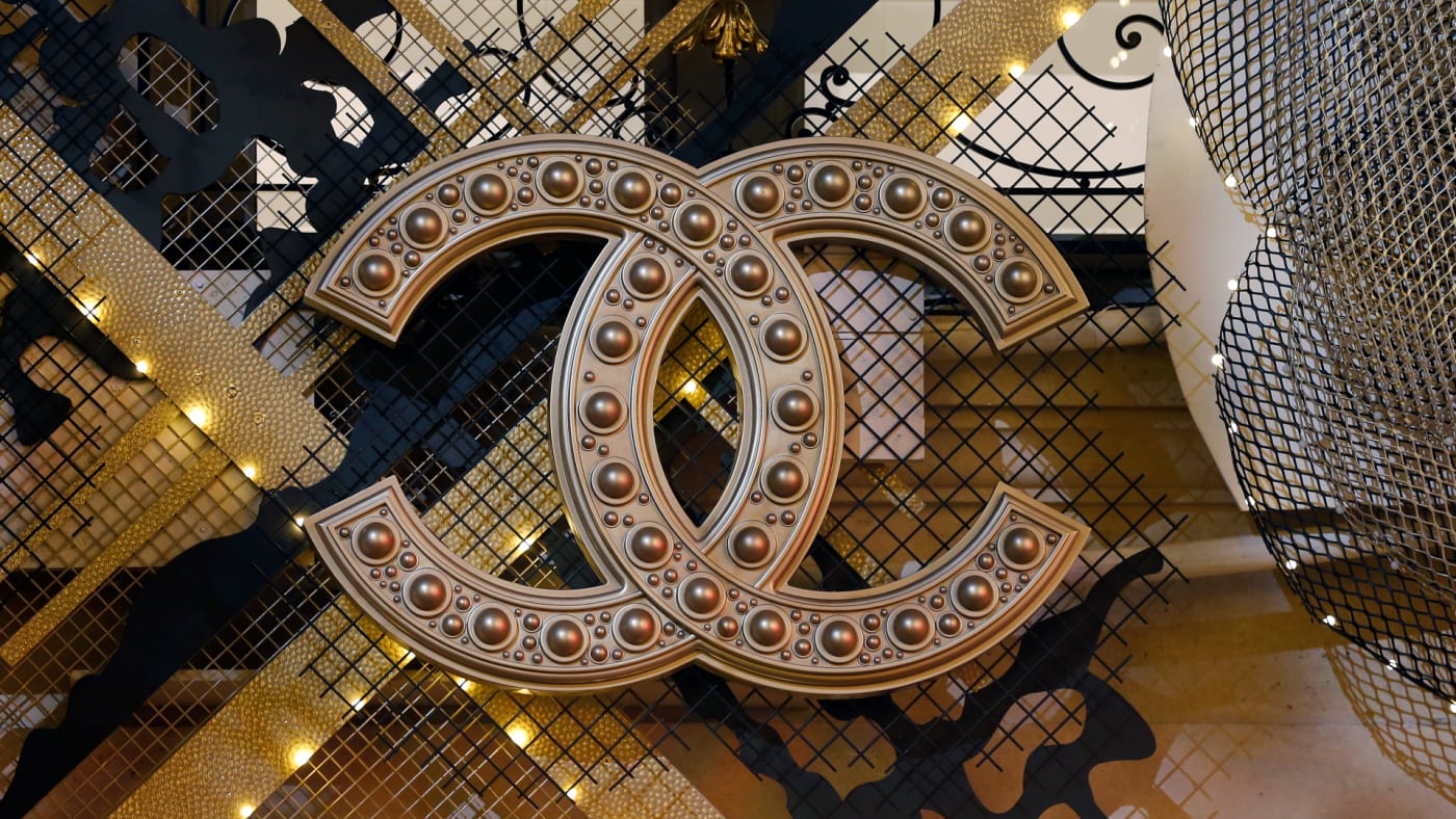 A Chanel logo is shown in a holiday theme