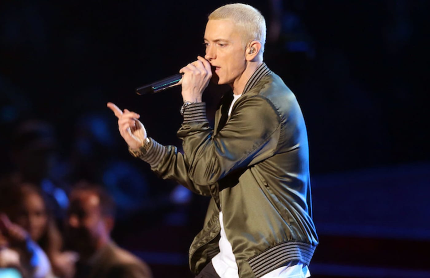 Rapper Eminem performs onstage at the 2014 MTV Movie Awards