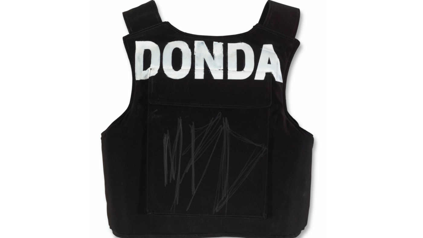 A Donda vest is shown with an MBD engraving.