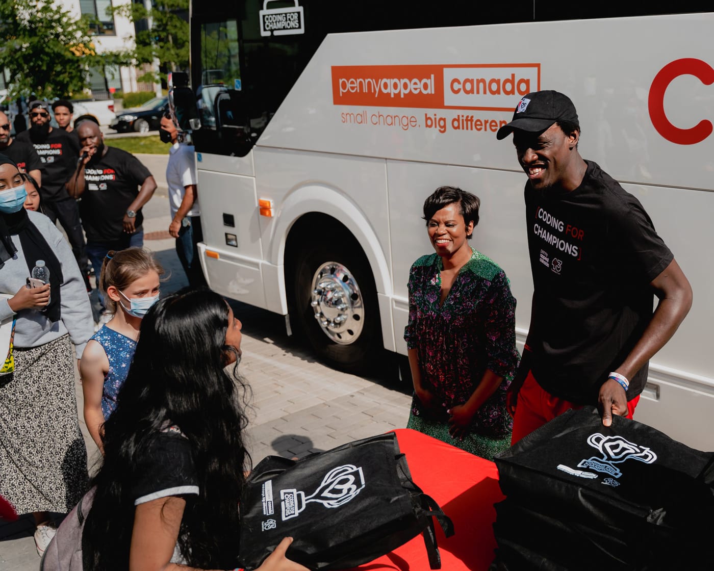 Toronto Raptors’ Star Pascal Siakam Hands Out Free Laptops to Middle School Girls in Regent Park