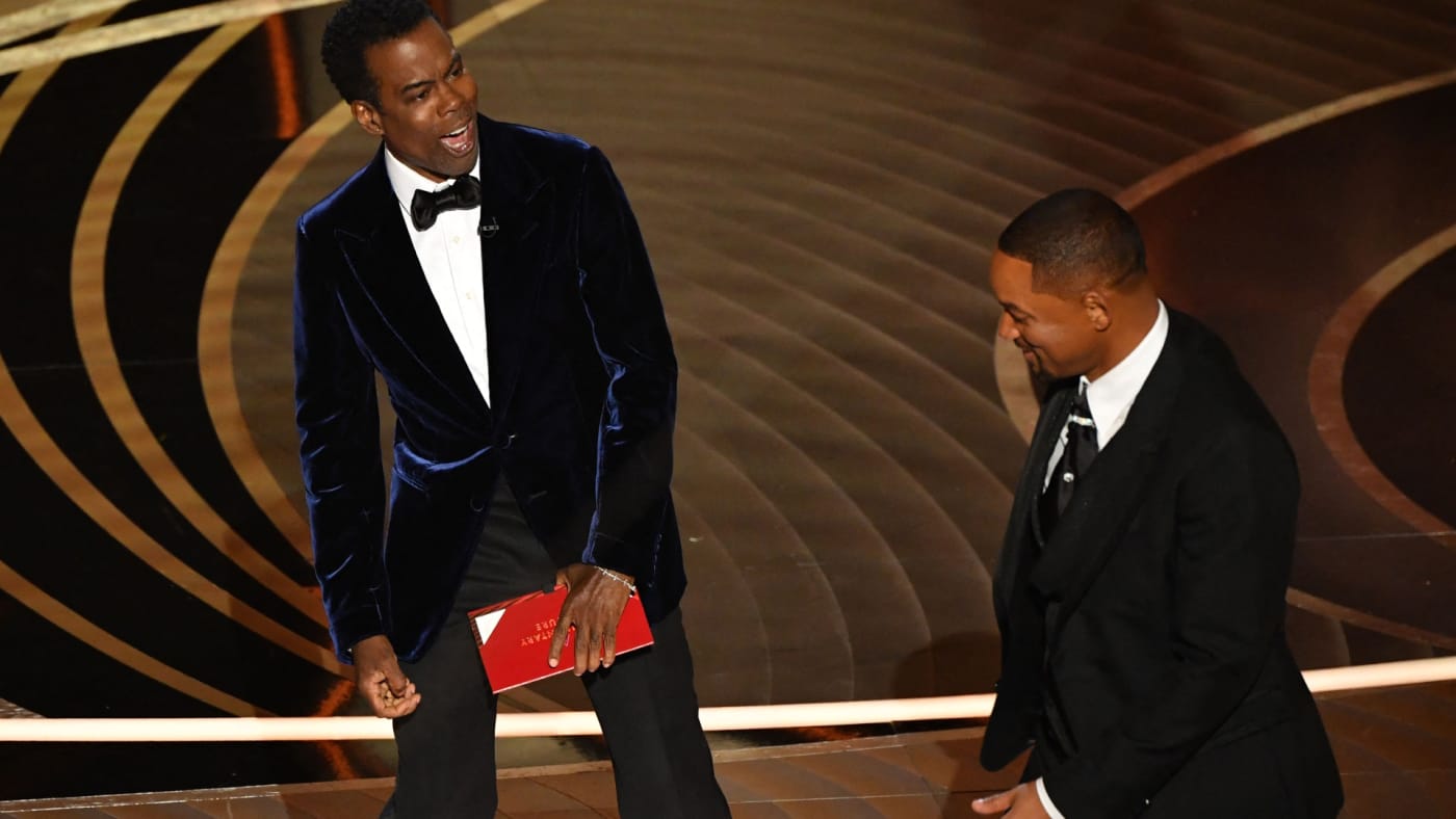 chris rock and will smith are pictured at the 2022 oscars