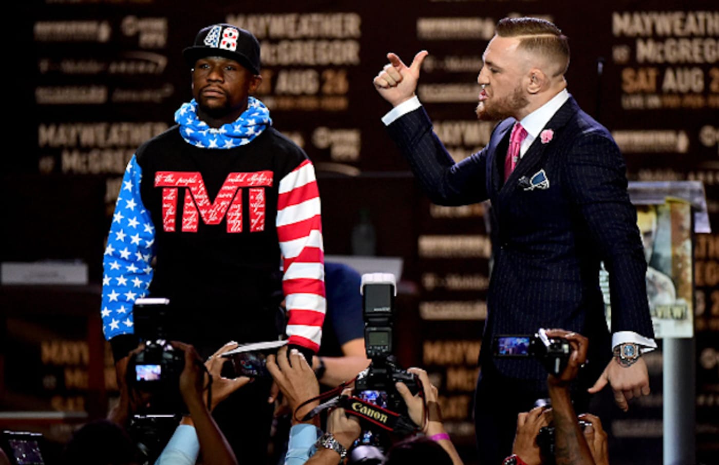 Floyd Mayweather Jr. and Conor McGregor faceoff on stage